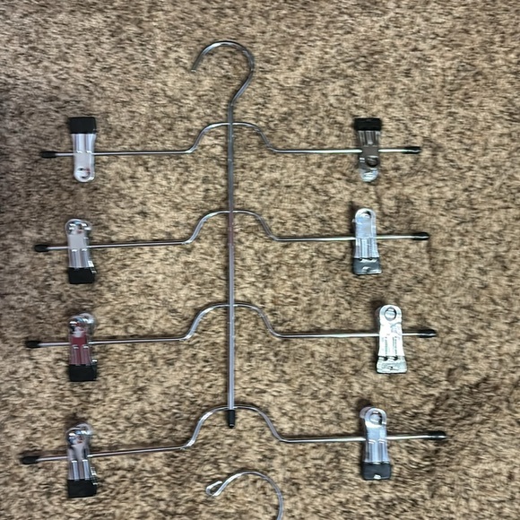 Bundle of two pants hangers with black rubber ends. - Picture 2 of 3